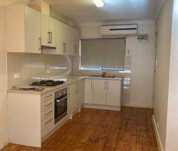 Two Bedroom Unit - Coastal Convenience with Everyday Comfort - Photo 2