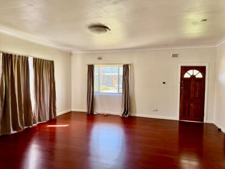 Neat & Tidy Permalum Home - Photo 2