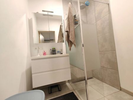 Energiezuinig appartement met tuin en autostaanplaats - Photo 5