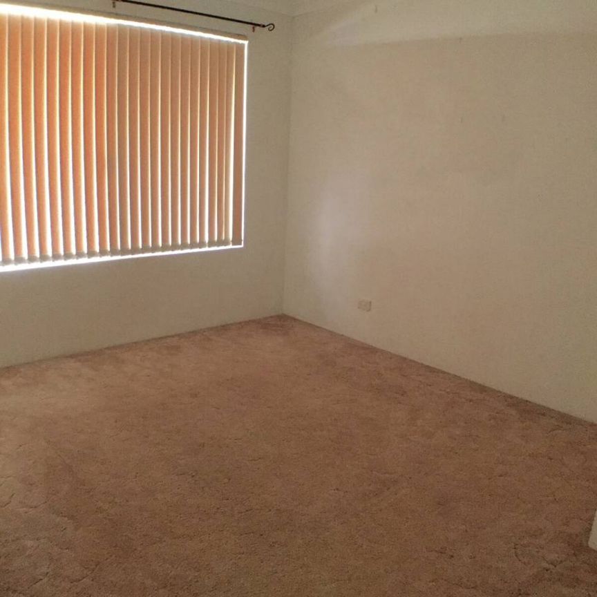 LARGE FAMILY HOME WITH STUDY! - Photo 1