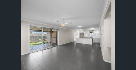 Large Family Home Featuring Two Living Areas - Photo 4