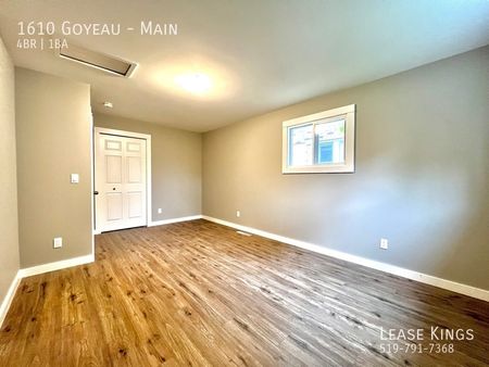 Completely Renovated 4 Bedroom 1 Bathroom Main Floor Unit - Photo 4