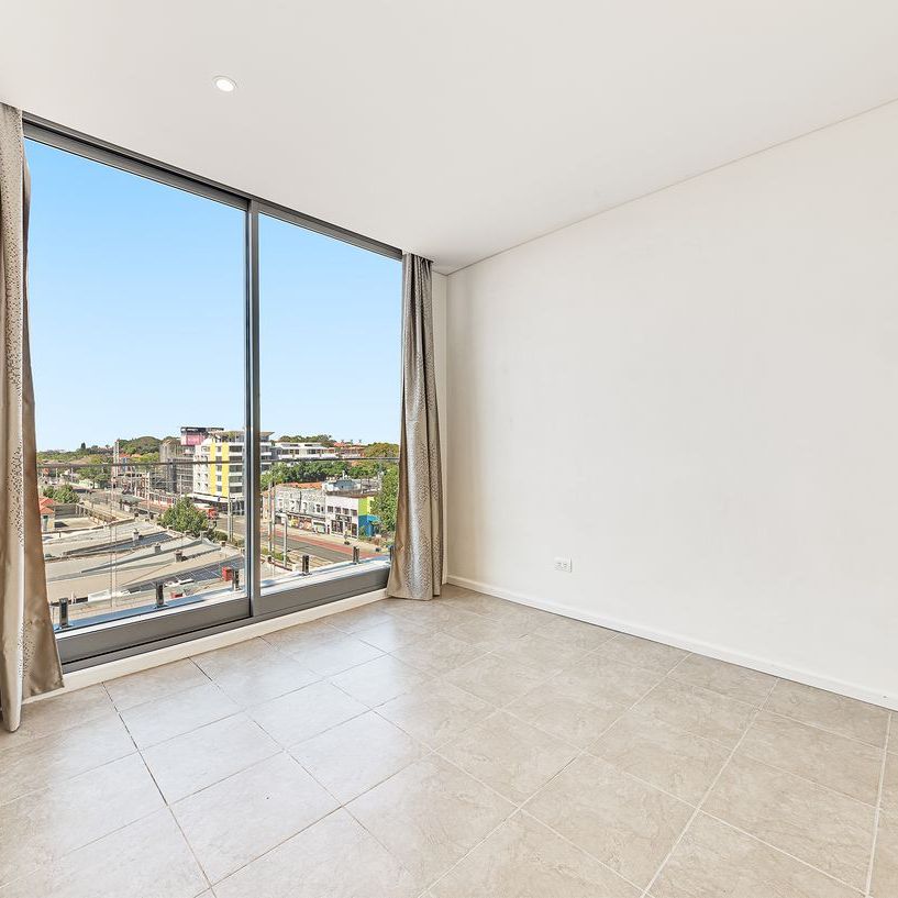 SPLIT LEVEL TWO BEDROOM TWO BATHROOM WITH SECURE PARKING! - Photo 1