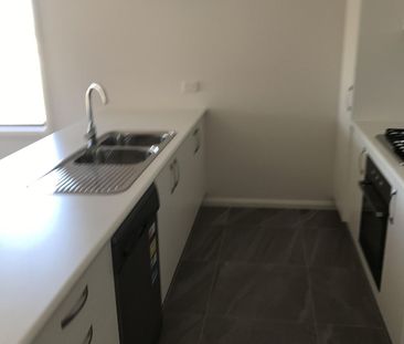 NEAR NEW 4 BEDROOM HOME - Photo 6