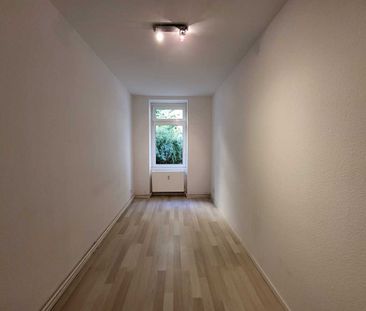 Helle 4-Zimmer-Wohnung mit Terrasse und Garten! - Foto 1