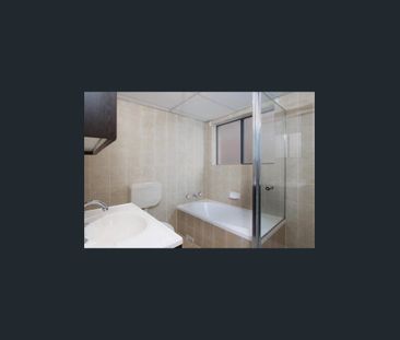 Large, neat & tidy unit fully tiled, with lock-up garage. - Photo 4