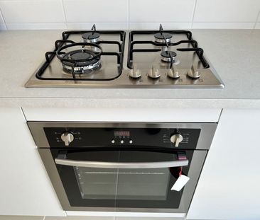 Modern 3-Bedroom Home with Garage in Growing Mambourin Community - Photo 5