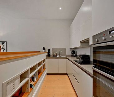 Welcome to this impeccably finished duplex apartment, where every d... - Photo 5