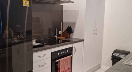 Modern, warm 4BR Home in Tuakau w/ Deck - Photo 4