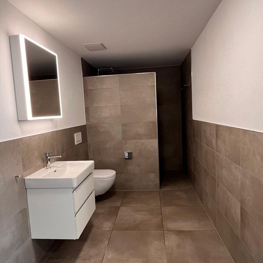 Frisch sanierte 2.5-Zimmerwohnungen an zentraler Lage in Lyss - Foto 1