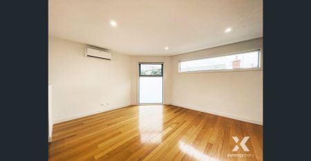 Contemporary Comfort in a Quiet Brunswick West Setting - Photo 2