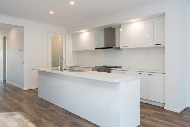 HEART-WARMING FAMILY HOME - Photo 1