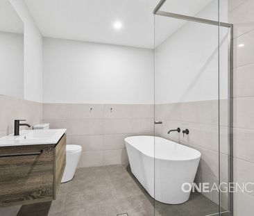 MODERN FAMILY HOME WITH COMFORT AND CONVENIENCE IN BADAGARANG - Photo 1