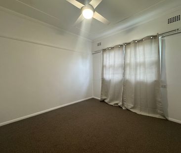 Freshly Painted 2-bedroom home - Photo 6