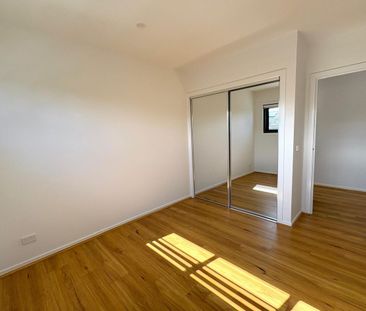 Modern 3-Bed, 2-Bath Family Living - Photo 3