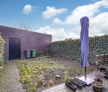 GELIJKVLOERSAPPARTEMENT MET TUIN EN GARAGE - Photo 4