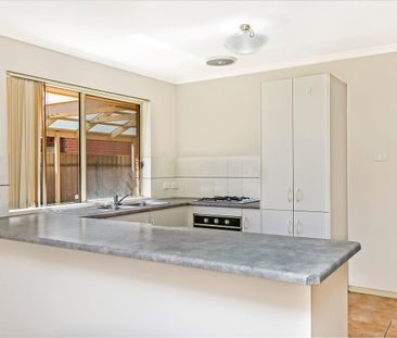 Three-Bedroom Family Home in Convenient Location! - Photo 4