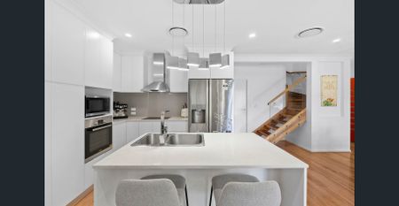 Stylish Townhouse with Exceptional Outdoor Living - Photo 2