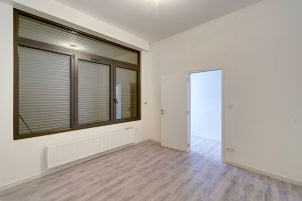 Gerenoveerd 1-slaapkamerappartement met terras in Antwerpen - Photo 1