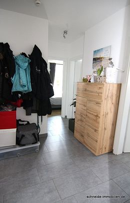 Attraktive 2-Zimmer-Erdgeschoss-Wohnung mit Terrasse und Gartenanteil - Foto 1