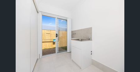 Near New Four-Bedroom Home with Ducted A/C & Media Room - Photo 5