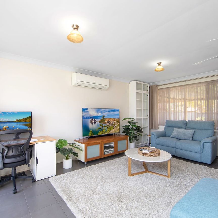 NEAT AS A PIN – GREAT FAMILY HOME IN A CONVENIENT LOCATION! - Photo 1