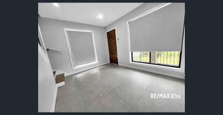 Modern Townhouse Living Awaits in Family-Friendly Oxley Park! - Photo 4