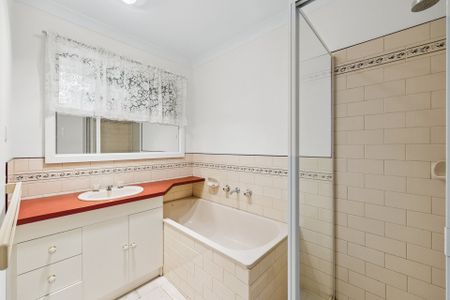 Refreshed Four-Bedroom Home With Gated Side Access - Photo 5