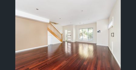 Spacious and Stylish Townhome in an Exceptional Location - Photo 5