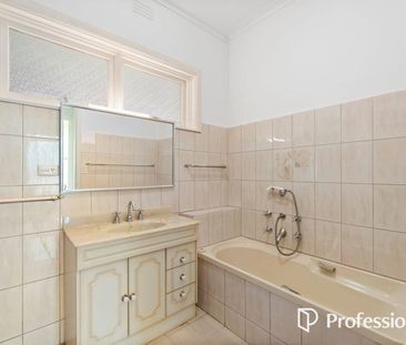 Spacious 4-Bedroom Family home in Prime McKinnon Zone - Photo 6