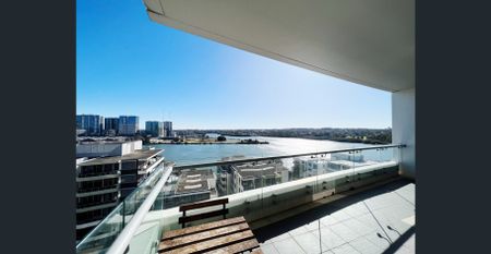 Two-bedroom apartment with stunning water and city views! Partly Furnished! - Photo 4