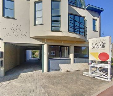 Vernieuwd gelijkvloers appartement met terras en tuin - Foto 3