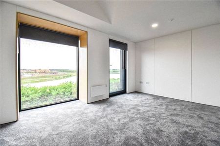 A beautifully crafted 3 bedroom semi-detached house situated within the growing community of Northstowe. Driveway parking. Highly efficient electric heating. Unfurnished. - Photo 3