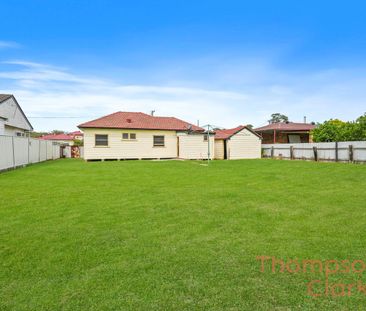 Neat 3 Bedroom Home with Large Yard - Photo 6