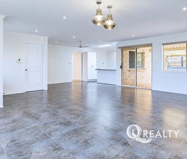 Spacious Lowset Brick Home with 4 Bedrooms - Photo 2