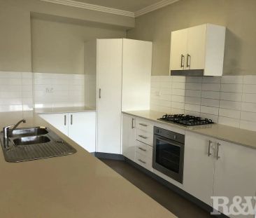 “Well presented 2 bedroom unit located in a secure building” - Photo 4