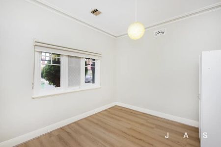 “Charming Home in A Desirable Location” - Photo 5