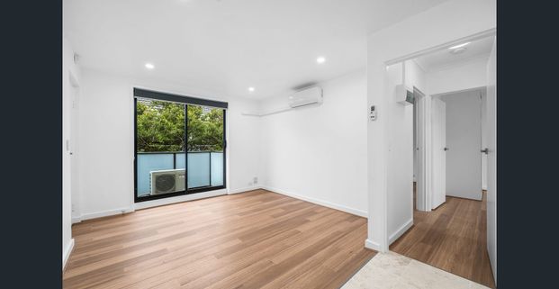 Newly Renovated Unit in Perfect Location! - Photo 1