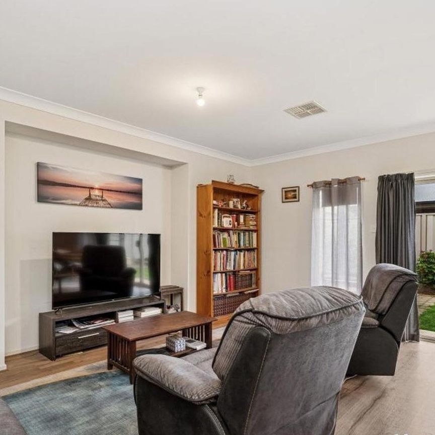 CONVENIENTLY LOCATED THREE BEDROOM HOME - Photo 1
