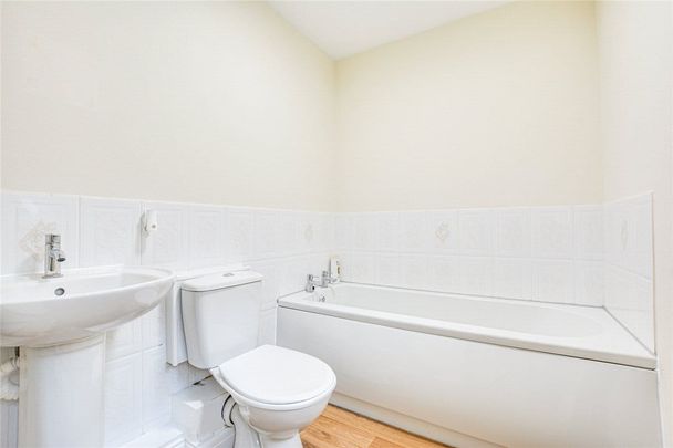 A 2 bedroom detached bungalow with a garage and driveway parking in Lowton. - Photo 1