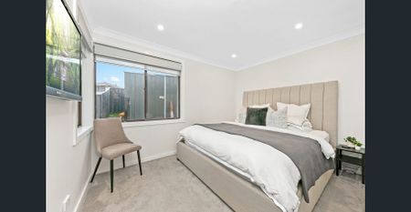 Impressive Family Home with Modern Features and Entertainer's Dream Deck - Photo 2