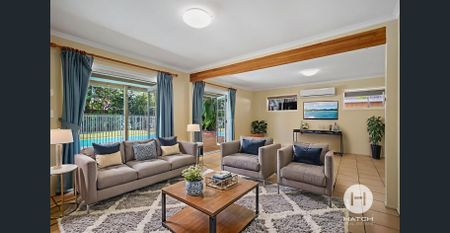 Spacious Family Home with Pool & Dual Driveways in a Prime Village Location - Photo 4