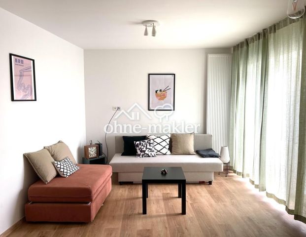 Exklusive Maisonette-Wohnung in Bestlage – Stil, Komfort und urbanes Lebensgefühl auf zwei Ebenen - Photo 1