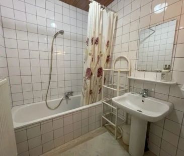 Gelijkvloers appartement met 2 slaapkamers en ruime tuin! - Photo 3