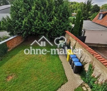 Helle 2-Raumwohnung mit Balkon und Garten - Foto 1