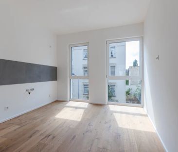 Tolle Familienwohnung mit Balkon im Neubau und Stilaltbau - Foto 1