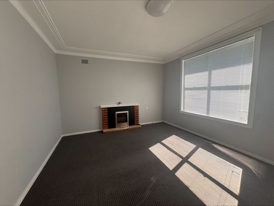 Comfortable Home with Spacious Yard - Photo 1