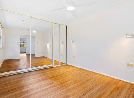 Two Bedroom Top Floor Unit in a Stunning Location with Water Views! - Photo 3