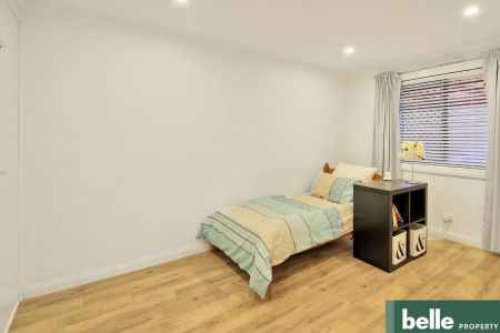 Contemporary Showpiece in Sought After School Catchment with Water & Electricity Included! - Photo 5