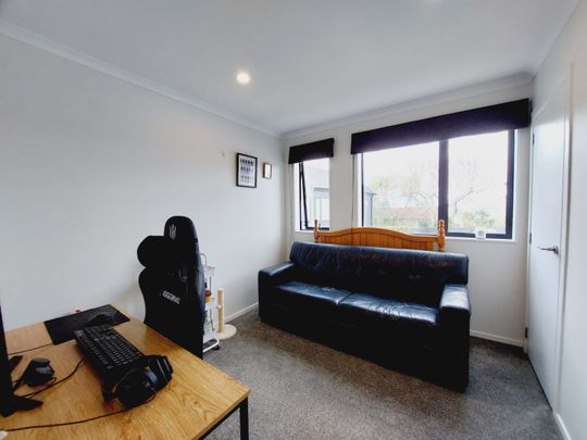 Stylish 2-Bedroom Home with Modern Comforts & Private Outdoor Spaces - Photo 1
